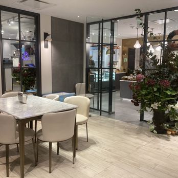 Pranzo - a dining room with a marble table and chairs - Juice Bars & Smoothies Near Me - Shelton, Connecticut