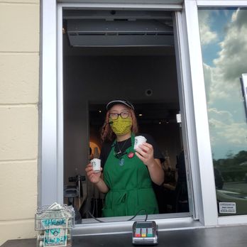 Starbucks - Barista handing me my babies pupacinos - Coffee & Tea Near Me - Kissimmee, Florida