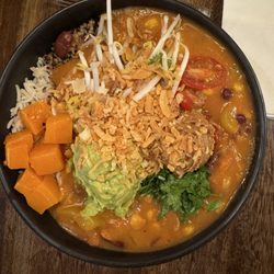 my Indigo Kongresshaus - Vegan African Pot curry bowl with veggies and plant based salm'n