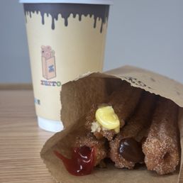 Churros (strawberry, vanilla, chocolate, and plain) Churros (strawberry, vanilla, chocolate, and plain)