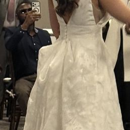 Dress with bustles of the train.