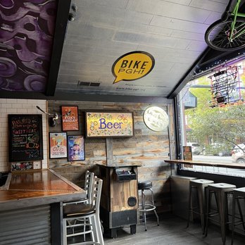 OTB Bicycle Café - a bicycle hanging from the ceiling - New American Near Me - Pittsburgh, Pennsylvania OTB Bicycle Café - a bicycle hanging from the ceiling - New American Near Me - Pittsburgh, Pennsylvania