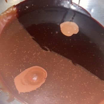 The Melting Pot - Milk and dark Yin & Yang Chocolate Fondue - Fondue Near Me - White Plains, New York The Melting Pot - Milk and dark Yin & Yang Chocolate Fondue - Fondue Near Me - White Plains, New York