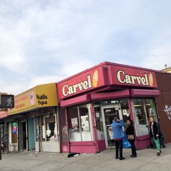 Carvel - a couple of people standing in front of a store - Ice Cream & Frozen Yogurt Near Me - Bronx, New York