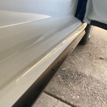 European Collision Center - Tape line runs across the entire passenger door you can feel it with your fingers. - Body Shops Near Me - Miami, Florida European Collision Center - Tape line runs across the entire passenger door you can feel it with your fingers. - Body Shops Near Me - Miami, Florida