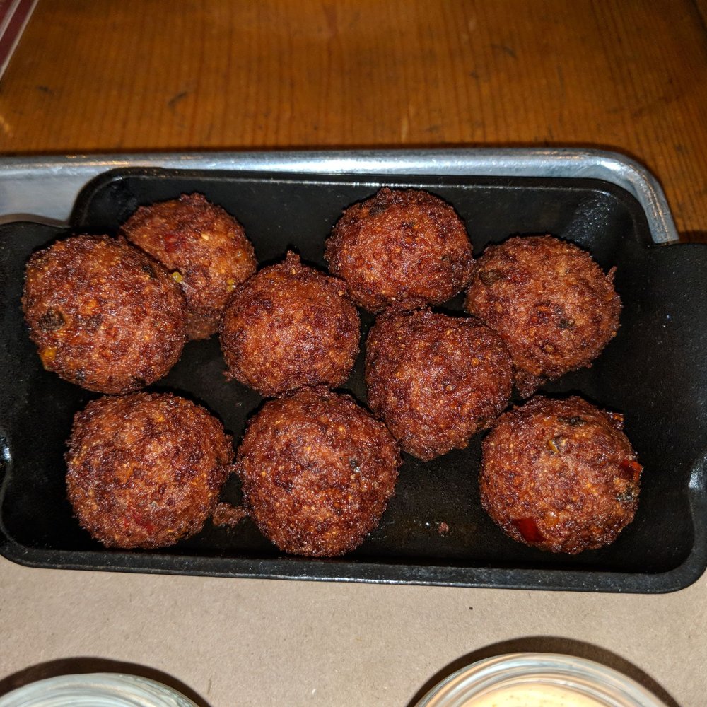 PIMIENTO CHEESE HUSH PUPPIES - Cornmeal, Cheddar, Pimiento, Jalapeños, Comeback Sauce