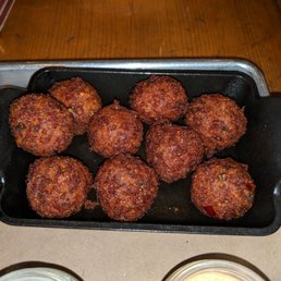 PIMIENTO CHEESE HUSH PUPPIES - Cornmeal, Cheddar, Pimiento, Jalapeños, Comeback Sauce