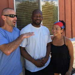 Lakeway TaeKwonDo - Master Chris regales dojang co-owner/wife Ms. Tieu & friend/teacher Master Malick Coulibaly dit Fall of Harlem TaeKwonDo (new dojang opens)