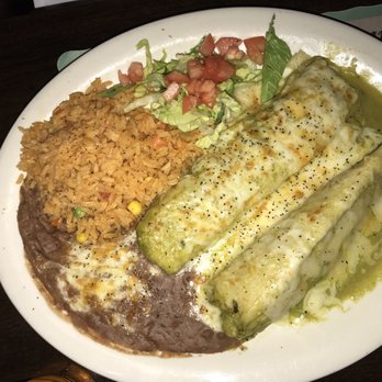 Tua Cocina - Shredded chicken Tamales over green sauce - Mexican Near Me - Blauvelt, New York