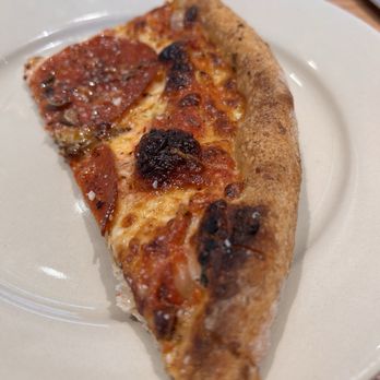 American Flatbread - Close up of the pepperoni and mushroom pizza. - Bowling Near Me - Worcester, Massachusetts