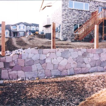XLT Landscape and Patio - a stone retaining wall - Landscaping Near Me - Denver, Colorado XLT Landscape and Patio - a stone retaining wall - Landscaping Near Me - Denver, Colorado