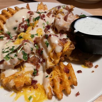 Applebee's Grill + Bar - Brew Pub Loaded Waffle Fries - Sports Bars Near Me - Spokane, Washington Applebee's Grill + Bar - Brew Pub Loaded Waffle Fries - Sports Bars Near Me - Spokane, Washington
