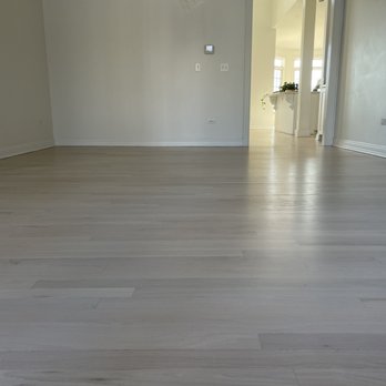 FloorLux - empty living room with hardwood floors - Flooring Near Me - St. Charles , Illinois