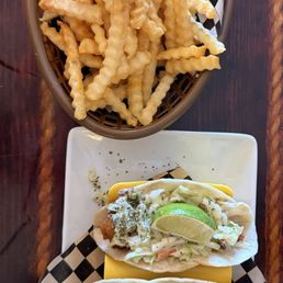 Fish Tacos and a small side of fries Fish Tacos and a small side of fries
