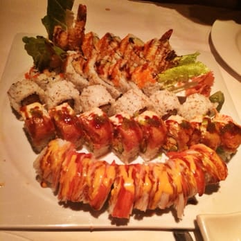 Sake Cafe - From top to bottom: shrimp tempura roll, shrimp tempura roll, spicy tuna roll, New Orleans roll, fire roll - Japanese Near Me - New Orleans, Louisiana Sake Cafe - From top to bottom: shrimp tempura roll, shrimp tempura roll, spicy tuna roll, New Orleans roll, fire roll - Japanese Near Me - New Orleans, Louisiana