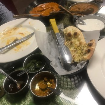 Slice of India - Chana masala, fish tiki masala, rice, garlic basil naan, yogurt sauce - Indian Near Me - Clovis, California Slice of India - Chana masala, fish tiki masala, rice, garlic basil naan, yogurt sauce - Indian Near Me - Clovis, California