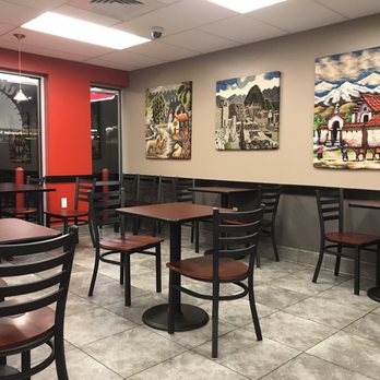 Pollo Peru - a restaurant with tables and chairs - Peruvian Near Me - Herndon, Virginia