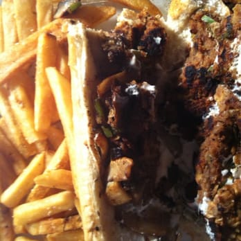 Block 16 - Sorry had to take a bite before the pic it's that good! Vegan Philly cheese steak sans onions and a side of fries! - American Near Me - Omaha, Nebraska