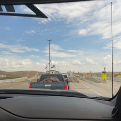 WM - Aurora - 2 other lines open. Each car takes at least 5 min. This place needs to do better.