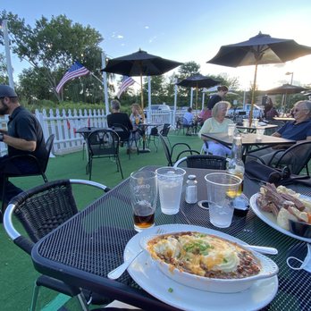 The Abbey - Comfortable outdoor seating. - Bars Near Me - New Milford, Connecticut The Abbey - Comfortable outdoor seating. - Bars Near Me - New Milford, Connecticut