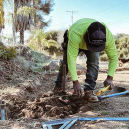 a man digging a hole in the ground a man digging a hole in the ground
