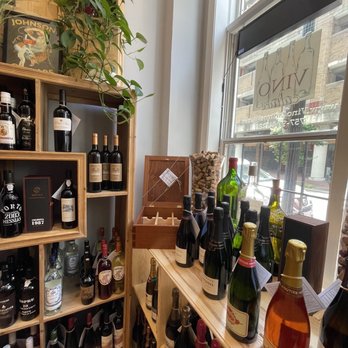 Vino Culture - bottles of wine on shelves in a wine shop - Wineries Near Me - Norfolk, Virginia Vino Culture - bottles of wine on shelves in a wine shop - Wineries Near Me - Norfolk, Virginia