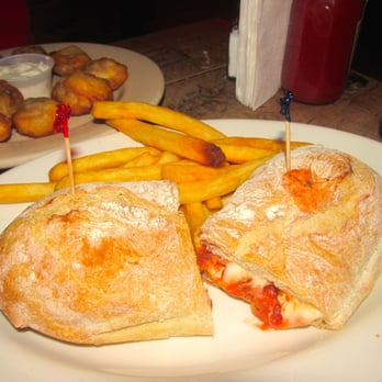 Peculier Pub - Chicken parmesan with fries. - Pubs Near Me - New York, New York Peculier Pub - Chicken parmesan with fries. - Pubs Near Me - New York, New York