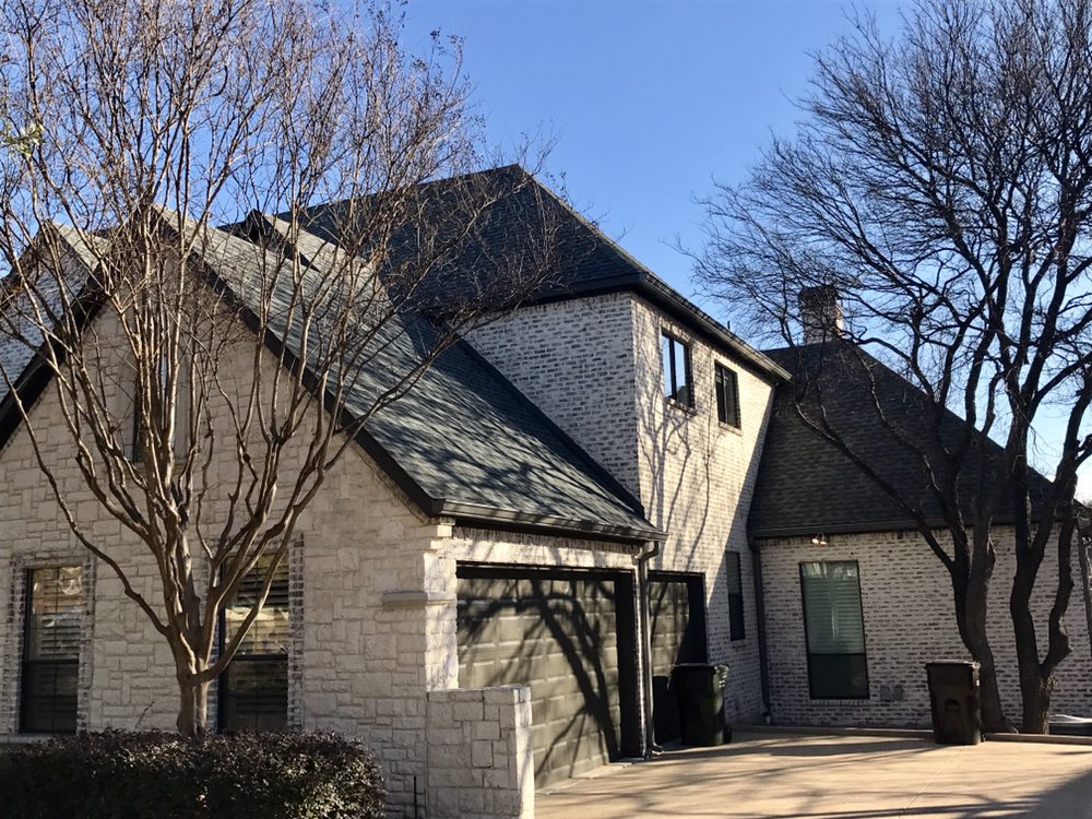 Slide of AM Roofing Company