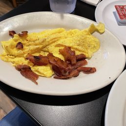 Eggs and bacon, my wife crumbled the bacon, it came as full strips Eggs and bacon, my wife crumbled the bacon, it came as full strips