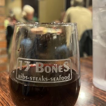 13 Bones - a glass of beer on a table - Salad Near Me - Mount Airy, North Carolina 13 Bones - a glass of beer on a table - Salad Near Me - Mount Airy, North Carolina