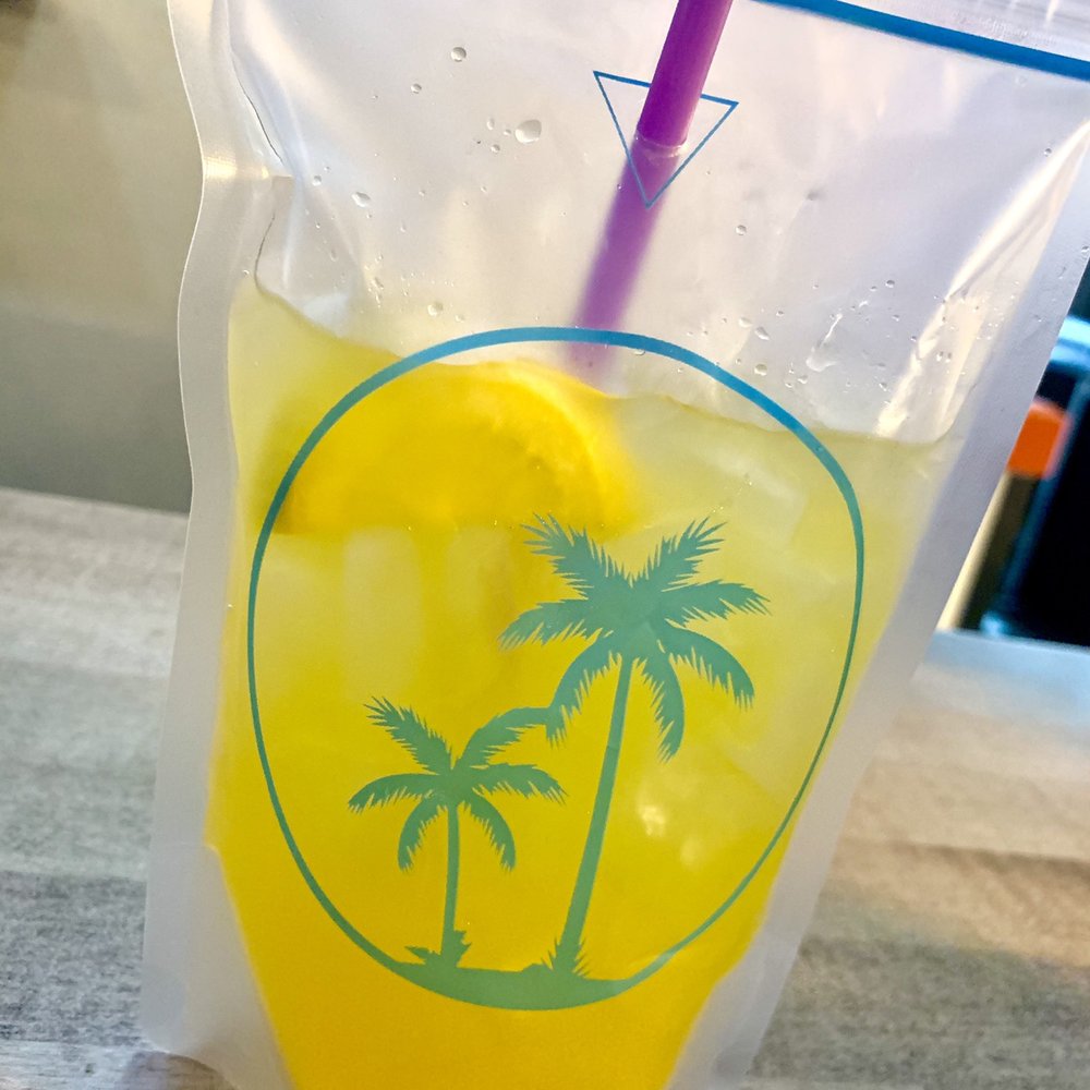 Sids Garage - Setting Sun Sangria (white wine, champagne float, fresh fruit and seasonal purée, $10.00) - Burgers Near Me - Meridian, Idaho Sids Garage - Setting Sun Sangria (white wine, champagne float, fresh fruit and seasonal purée, $10.00) - Burgers Near Me - Meridian, Idaho