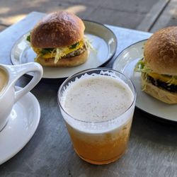 Fable - Lavender blossom latte, lemon lavender soda with oat cream, pesto breakfast sandwich, turkey sausage breakfast sandwich