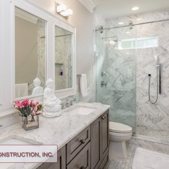 R & R Construction - a bathroom with marble countertops - General Contractors Near Me - Gainesville, Florida