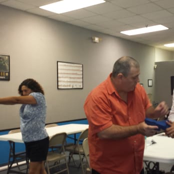 Eddy's Security Training - Teaching the right way to handle a handgun!! (using blue safety guns) - Gun/Rifle Ranges Near Me - Orlando, Florida