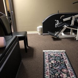 Chiro Dynamics - Therapy room. Rolling bed on left.