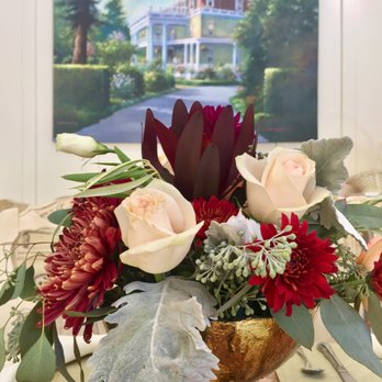 Berry & Bloom Floral - One of our floral centerpieces, each a little different - Wedding Planning Near Me