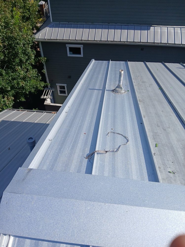 Slide of Anvil Roofers