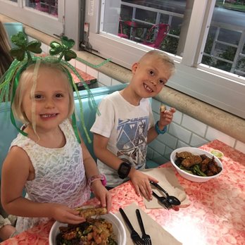 Fresh Kitchen - Happy kids enjoying their bowls ! - New American Near Me - Sarasota, Florida Fresh Kitchen - Happy kids enjoying their bowls ! - New American Near Me - Sarasota, Florida