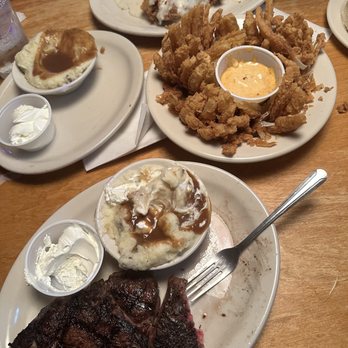 Texas Roadhouse - Country Fried Sirloin with cream gravy, Cactus Blossom, Ft. Worth Ribeye 12oz with mashed potatoes, brown gravy + butter & sc - Steakhouses Near Me - Miami, Florida Texas Roadhouse - Country Fried Sirloin with cream gravy, Cactus Blossom, Ft. Worth Ribeye 12oz with mashed potatoes, brown gravy + butter & sc - Steakhouses Near Me - Miami, Florida