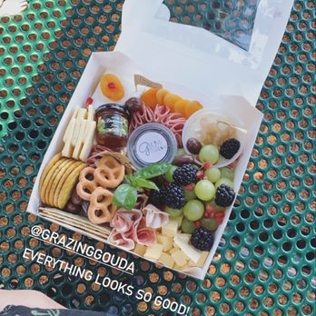 Grazing Gouda - So many different goodies in small picnic box! - Caterers Near Me Grazing Gouda - So many different goodies in small picnic box! - Caterers Near Me