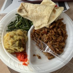 Roopram Roti - Dalpurie Roti with tofu, potatoes, bodi (yard bean) and pepper. Tasted great just like you will get in Trinidad.