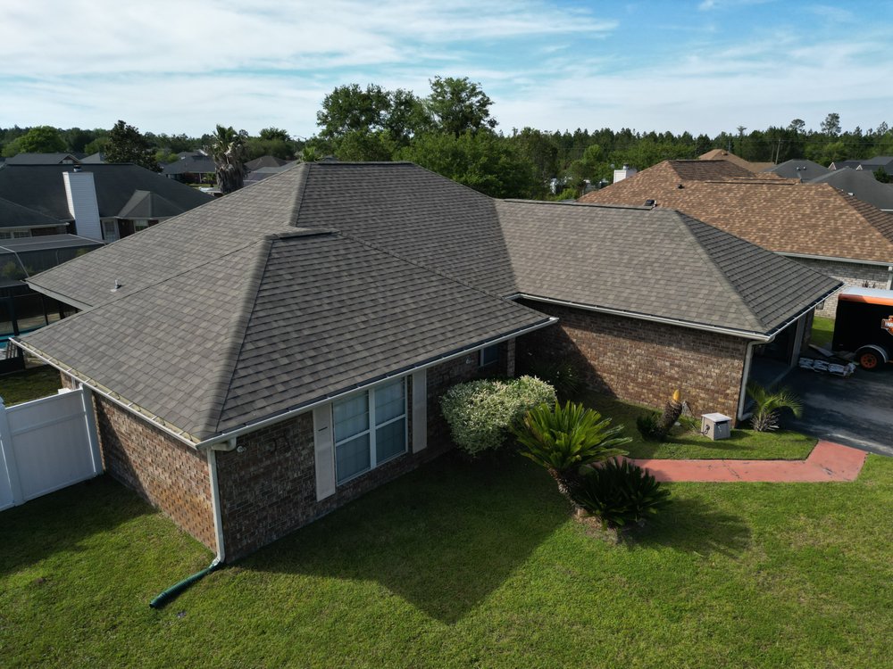 Slide of Talya Roofing