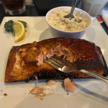 Callahan's Pub & Grille - Grilled salmon with whiskey sauce and garlic potatoes. - Pubs Near Me - Enid, Oklahoma Callahan's Pub & Grille - Grilled salmon with whiskey sauce and garlic potatoes. - Pubs Near Me - Enid, Oklahoma