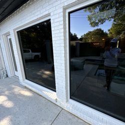 Simple Glass - Sunroom/living room windows that were once eight windows reduced to four windows that are large