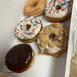 Finkles Bake Shop - Boston crème, white chocolate, birthday cake, and glazed.