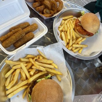 Smashin Burgers - Classic Smash Burger, Beer Battered Onion Rings, Mozzarella Cheese Sticks (5 Count) and Chicken Tender Sandwich Combo. - Burgers Near Me - Jackson, Georgia Smashin Burgers - Classic Smash Burger, Beer Battered Onion Rings, Mozzarella Cheese Sticks (5 Count) and Chicken Tender Sandwich Combo. - Burgers Near Me - Jackson, Georgia