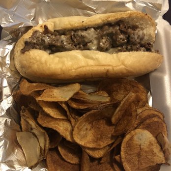 Bogarts Restaurant - a hot dog and chips in a styrofoam container - Bars Near Me - West Columbia, South Carolina Bogarts Restaurant - a hot dog and chips in a styrofoam container - Bars Near Me - West Columbia, South Carolina