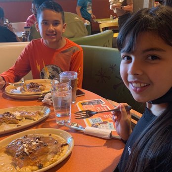 Snooze, an A.M. Eatery - Niece and nephew enjoying Snoozes awesome pancakes!! - Breakfast & Brunch Near Me - Tustin, California Snooze, an A.M. Eatery - Niece and nephew enjoying Snoozes awesome pancakes!! - Breakfast & Brunch Near Me - Tustin, California