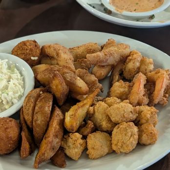 North Beach Fish Camp - Fried Trio Platter (Fish-Grouper, Scallops, & Shrimp) with Hush Puppies, Fries and Coleslaw - New American Near Me - Neptune Beach, Florida