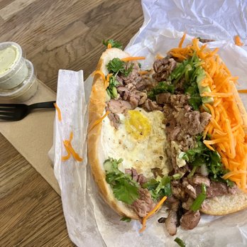 Sizzle&Crunch - Grilled Pork Banh Mi with fried egg - Vietnamese Near Me - Seattle, Washington Sizzle&Crunch - Grilled Pork Banh Mi with fried egg - Vietnamese Near Me - Seattle, Washington